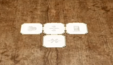 Four room cards connected around a central junction on the table